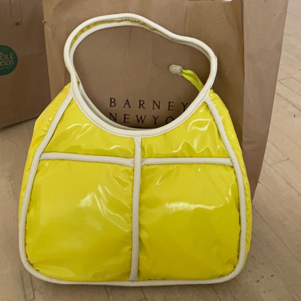 Bright yellow Barney’s bag